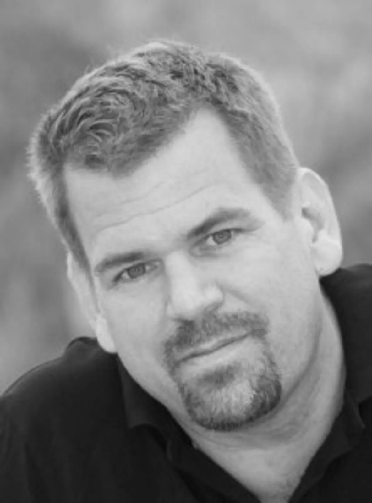 chris-cv-pic-black-and-white-222x300.jpg